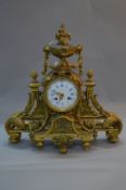 A MID 19TH CENTURY FRENCH ORMOLU MANTEL CLOCK, ornate floral urn surmount flanked by pineapple