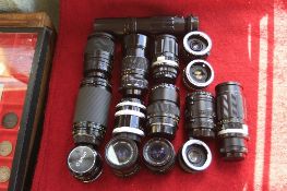 A SELECTION OF CAMERA LENSES, to include a Canon 35-70 F3.5/4.5, a Canon 50mm F1.8 lens, a Tokina
