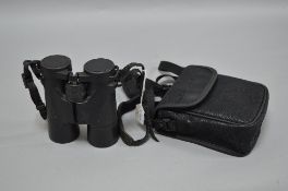 A PAIR OF PYSER, CURRENT MOD ISSUE MILITARY BINOCULARS, E8 X 42RM, waterproof rubber casing and