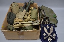 A BOX CONTAINING A LARGE NUMBER OF US ISSUE WWII ERA MILITARY ITEMS, to include kit bags, field