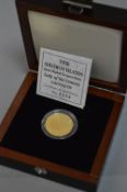 A GOLD SOLOMON ISLANDS GOLD PROOF $50 LADY OF THE CENTURY 14K COIN, 7.776 grams, with certificate