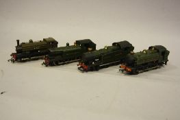 A QUANTITY OF UNBOXED CONSTRUCTED OO GAUGE WHITE METAL LOCOMOTIVE KITS, most appear to be on a Tri-