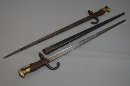 TWO FRENCH GRAS BAYONETS, 1874 pattern, one marked along top of blade Paris 1880, no scabbard, the