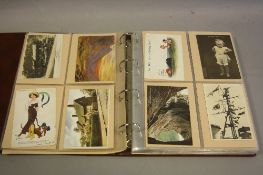 A LOOSE LEAF POSTCARD ALBUM, loosely inserted late 19th and early 20th Century topographical,