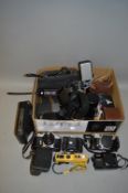 A BOX OF CAMERA EQUIPMENT, including a Prinzflex, Yashica, Canon, Zeiss Ikon, Kodak and a