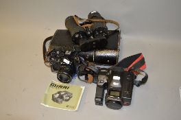 A CASED PAIR OF LEITZ 7 X 50 BINOCULARS, a Zenith 12XP SLR and a Ricoh Mirra camera