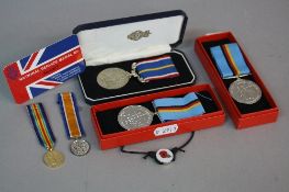 THREE BOXED MEDALS, consisting of two British Forces Germany medals and a Royal British Legion