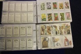 TWO ALBUMS OF CIGARETTE CARDS, all complete sets, manufacturers include Carreras, Gallaher, John