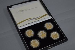 A ROYAL MINT 2006 BRITANNIA GOLDEN SILHOUETTE COLLECTION, five silver and gold £2 coins with COA