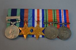 A COURT MOUNTED GROUP OF WWII ERA MEDALS, consisting of India General Service medal, North West
