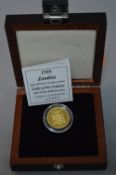 A BOXED GOLD PROOF 10,000 KWACHA ZAMBIA 1999 22K COIN, 7.776 grams, in box of issue with