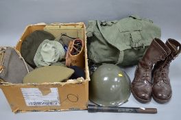 A LARGE BOX OF US ISSUE MILITARY ITEMS, to include caps, beret with South Staffordshire badge, metal