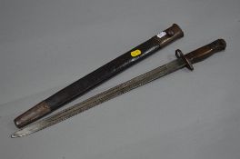 A WWI ERA RIFLE BAYONET AND SCABBARD, marked on riccasso 1907 Crown & CR, also proof marks