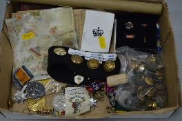 A BOX CONTAINING A NUMBER OF MEDALS AND MILITARY BADGES AND BUTTONS, PAPERWORK, etc, to include a