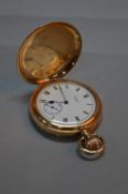 A 9CT GOLD FULL HUNTER WALTHAM POCKET WATCH, white enamel face, secondary dial, approximate weight