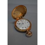 A 9CT GOLD FULL HUNTER WALTHAM POCKET WATCH, white enamel face, secondary dial, approximate weight