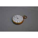 A LADIES 18K GOLD FRENCH FOB WATCH, white enamel dial, approximately 26 grams