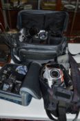 THREE CAMERA BAGS CONTAINING FIVE PRAKTICA CAMERAS AND LENSES, these include a L, a BCA