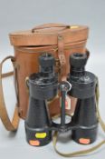 A PAIR OF 1944 B.H. & G LTD FIELD BINOCULARS, in brown leather case, WWII era and military issue,