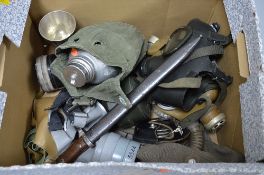 A DEALERS/TRADERS LARGE BOX CONTAINING FIVE MILITARY ISSUE GAS MASKS, WWII era and beyond, canvas