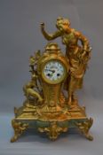 A LATE 19TH CENTURY FRENCH GILT METAL FIGURAL MANTEL CLOCK, cast with a girl and two lambs