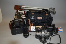 A COLLECTION OF SLR, DIGITAL AND CINE CAMERAS AND ACCESSORIES, including a Canon AV1 with 50mm 1:1.8