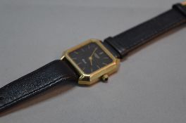 LONGINES 18CT GOLD GENTS WRISTWATCH, rectangular face, black dial, number 18962235