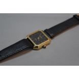 LONGINES 18CT GOLD GENTS WRISTWATCH, rectangular face, black dial, number 18962235