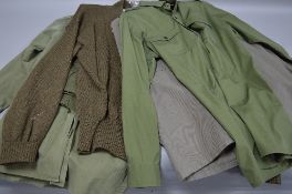 SEVEN ITEMS OF WWII ERA MILITARY UNIFORM, to include shirts, sweater, trousers, smock top etc (