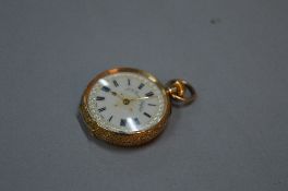 A LADIES 14K GOLD OPEN FACED FOB WATCH, approximately 28.2 grams