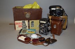 A CASED ROLLEIFLEX 2.8E TLR CAMERA, Serial No.1754627, fitted with a Carl Zeiss Jena Planar 75mm 1: