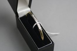 A 9CT GOLD BANGLE, approximate weight 4.9 grams