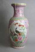 A LARGE ORIENTAL REPUBLIC OF CHINA VASE, famille rose decoration with peacocks, birds and foliage,