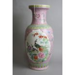 A LARGE ORIENTAL REPUBLIC OF CHINA VASE, famille rose decoration with peacocks, birds and foliage,