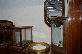 AN OAK GLAZED HANGING CORNER CABINET, and two various mirrors (3)