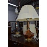 A SILVER PLATED COLUMN STYLE TABLE LAMP, and a copper table lamp with shade (2)