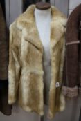 A FUR JACKET, size 12, beige and cream in colour