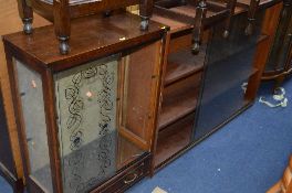 A 1970'S DISPLAY CABINET, and a sliding glazed door bookcase (2)