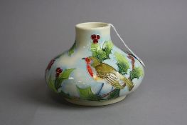 A BOXED OLD TUPTON WARE SQUAT VASE, tube lined decorated with Robin & Holly, height approximately