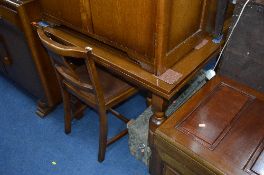 AN OAK DRAWLEAF TABLE, four chairs and a sideboard (6)
