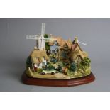 A BOXED LIMITED EDITION LILLIPUT LANE SCULPTURE 'The Village Green' L2558, 871/2500, with plinth and
