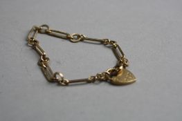 A 9CT LOCKET BRACELET, approximate weight 7.3 grams