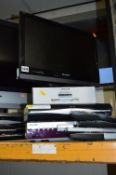 A SHARP 19' LCD TV, a boxed Freecom mobile DVD player, a Sky + HD box and a Pacific DVD player (four