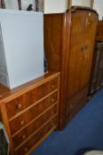 AN OAK THREE PIECE BEDROOM SUITE, comprising of two wardrobes, dressing table and a seperate chest
