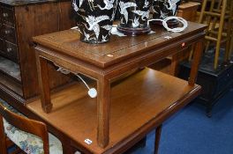 AN ORIEINTAL HARDWOOD COFFEE TABLE, and a matching pair of occassional tables (3)