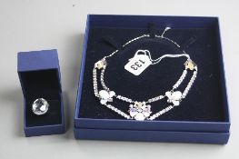 A SWAROVSKI NECKLACE AND RING