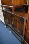 AN EARLY 20TH CENTURY OAK SIDEBOARD, on barley twist legs, approximate size width 123cm