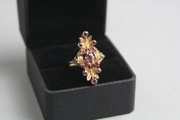 AN 18CT RUBY AND DIAMOND RING, ring size O, approximate weight 5.3 grams