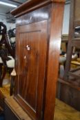 A MAHOGANY HANGING CORNER CUPBOARD (key)