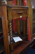 AN OAK BARLEY TWIST SIDETABLE, a red painted easel and a hall mirror with key box (3)